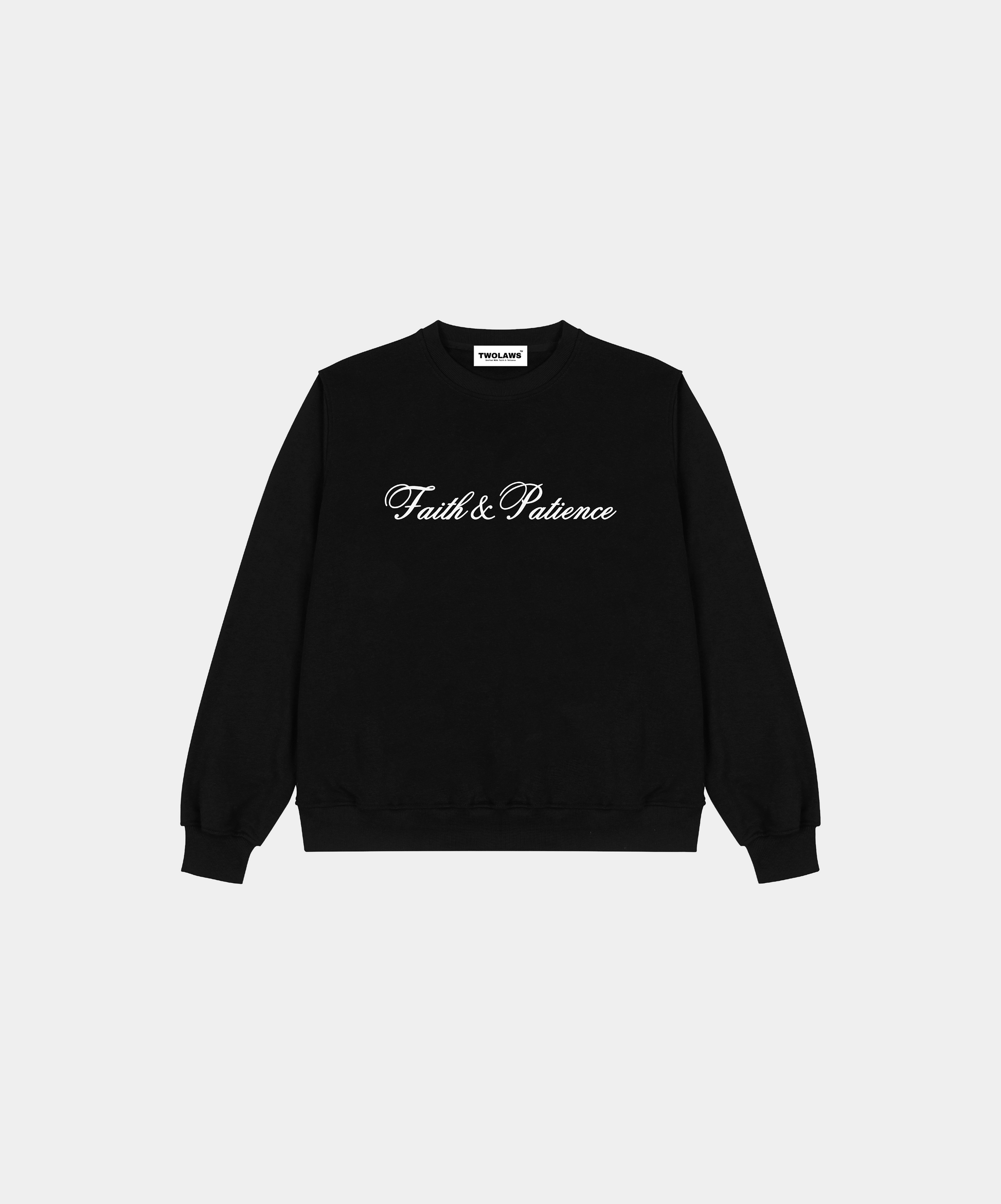 Oversized black streetwear sweatshirt with 'Faith & Patience' printed on front and TWOLAWS logo on back.