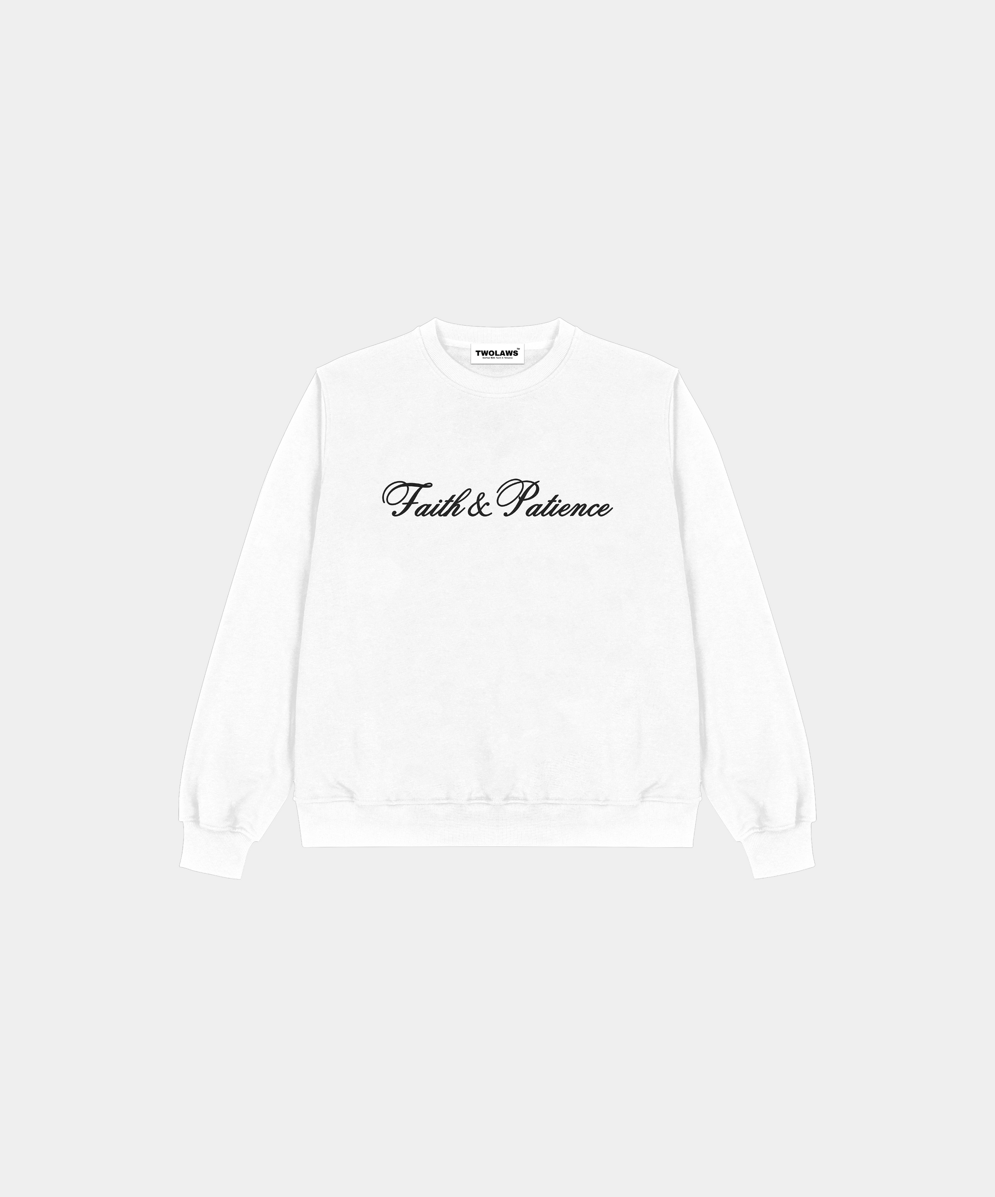 Oversized white streetwear sweatshirt with 'Faith & Patience' printed on front and TWOLAWS logo on back.
